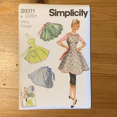 an old fashion sewing pattern for women's aprons and dresses, with the words simpl city written on it