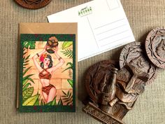 an image of some art work on the table next to other items that are being used for crafts