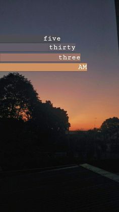 the sun is setting over some trees and buildings with words above it that read five thirty three am