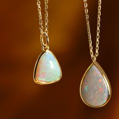 This bespoke pendant features a mega 3.65ct Australian opal pear, beautifully complemented by a 14k gold bezel setting. Style this fiery gem layered or solo for the most captivating neck statement. Classic Jewelry Pieces, Fiery Red, Gold Piece, Classic Jewelry, Australian Opal, Recycled Gold, Opal Necklace, Bezel Setting, Custom Jewelry