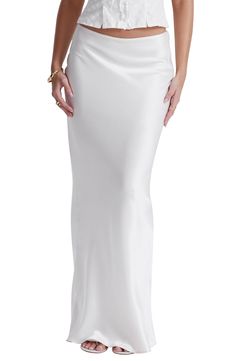 Stunning bias-cut satin lends superior drape to this low-waist maxi skirt that flows to the floor. Exclusive retailer Lined 75% acetate, 25% polyester Dry clean Imported White Maxi Skirt Outfit, White Satin Skirt, Silky Skirt, White Long Skirt, Satin Maxi Skirt, White Maxi Skirts, Maxi Skirt Outfits, Skirt Trends, Outfit Formulas