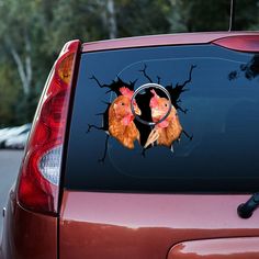 two chickens in the middle of a circle on a car's window sticker