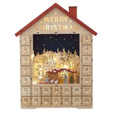 a wooden calendar with a christmas scene on it