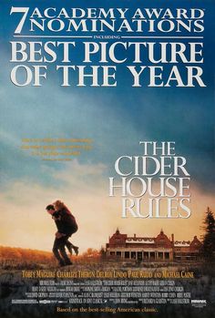 the cider house rules movie poster with an image of a man holding a woman