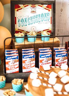 a table topped with lots of snacks and desserts