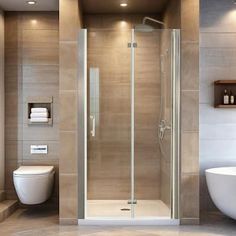 a bathroom with a tub, toilet and shower in it's corner stall area