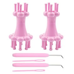 three pink hairdryers are next to each other with scissors and tweezers