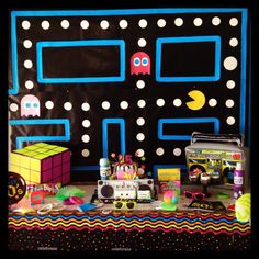 Totally Rad 80's Party Table - Pacman background, Rubic cube, boom box, nerds, leg warmer, fishnet gloves etc! Pacman Birthday Party, Diner Birthday Party, Scaffold Board Table, Pacman Birthday, Cabinet Upcycle, Sulking Room Pink, Arcade Party, Elegant Table Decor