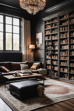 a living room filled with lots of furniture and bookshelves next to a window