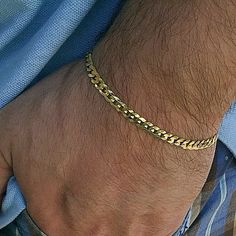 Mens Cuban Curb Link chain bracelet. Measures 8" inches long and 5 mm wide.  Solid 925 sterling silver w/14k gold plating. Stamped 925 and Italy on lobster claw clasp. Available on our hip hop jewelry site. Mens Bling, Gold Arm Band, Girly Bracelets, Mens Gold Bracelets, Silver Flats, I Phone, Gold Locket, Hip Hop Jewelry, Jewelry Model