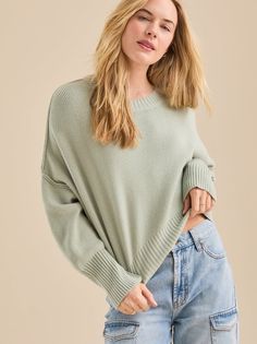 Embrace effortless chic with this cropped balloon sleeve pullover. This dreamy sweater features a relaxed fit and romantic puff sleeves, perfect for layering or wearing solo. Relaxed Fit Long Sleeve Cropped Sweater In Soft Knit, Spring Soft Knit Sweater With Balloon Sleeves, Spring Sweater With Balloon Sleeves, Cozy Puff Sleeve Spring Sweater, Spring Cozy Puff Sleeve Sweater, Everyday Long Sleeve Cropped Sweater, Casual Sweater With Blouson Sleeves, Casual Winter Sweater With Blouson Sleeves, Oversized Balloon Sleeve Sweater In Soft Knit