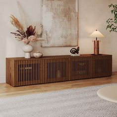 a living room scene with focus on the sideboard