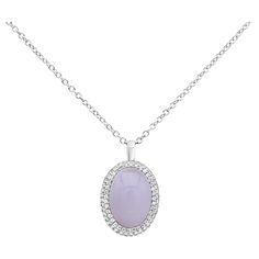 A fashionable pendant necklace showcasing an oval lavender chalcedony weighing 7 carat. Center stone is accented with bright round diamonds weighing 0.79 carats total, F color and VS clarity. Made in 18 karats white gold. Roman Malakov is a custom house, specializing in creating anything you can imagine. If you would like to receive a special quote on a custom piece please message or call us. Luxury Elegant Jewelry With Oval Cabochon, Luxury Oval Pendant Necklaces With Natural Stones, Luxury Natural Stones Oval Pendant Necklaces, White Gold Pendant Necklace, Gold For Sale, Custom House, Oval Cabochon, Round Cut Diamond, Oval Cut