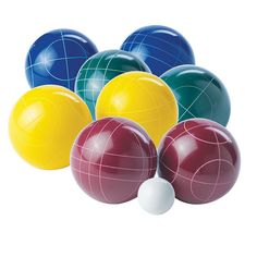 several colorful balls and one white ball in the middle