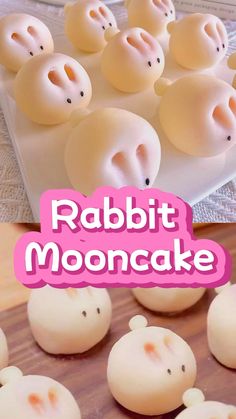 rabbit mooncakes on a wooden table with pink text reading rabbit mooncakes