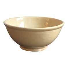 a white bowl sitting on top of a table