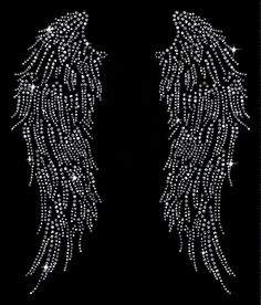 an angel wings with pink and white crystals on black background, in the shape of diamonds