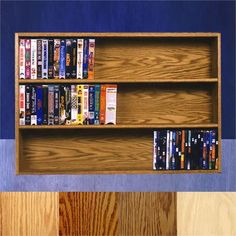 a wooden book shelf filled with lots of books