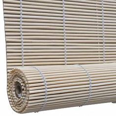 a roll of bamboo is shown on the side of a white wall with vertical slats