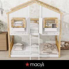 there is a bunk bed with two sets of beds on top of it and a ladder to the bottom