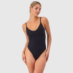 A sexy design that always brings the heat, this soft and seamless lace bodysuit is crafted with high-stretch fabric for a flexible fit you’ll love. The classic V-neck bodysuit features adjustable, convertible straps and wireless 2-ply cups for support and modesty. Detailed with a thong back, it is ideal for effortless layering. Whether worn solo or paired under your favorite jacket, its smooth finish guarantees a flawless look. Maidenform M: Because you deserve intimates as confident as you are. Solid Nylon Bodysuit With Built-in Bra, Solid High Cut Lined Bodysuit, High Cut Solid Leotard With Lined Body, High Cut Nylon Bodysuit With Built-in Bra, Elegant High Stretch Leotard With Built-in Bra, Stretch Bodysuit With Built-in Bra And High-cut Leg, High Stretch One-piece Shapewear Bodysuit, High Cut Lined Body Shapewear For Summer, Summer Shaping Seamless Bodysuit