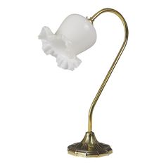 an antique brass desk lamp with a white glass shade