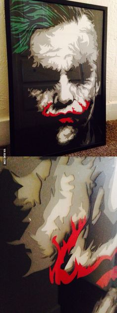 two paintings of the joker are on display