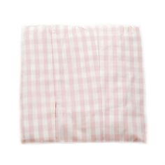 a pink and white checkered sheet on a white background