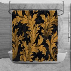 a black and gold shower curtain with an intricate design on it in a bathroom setting