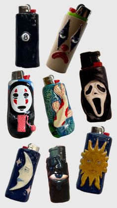 several lighters with different designs on them are arranged in the shape of an evil face