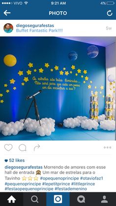 an image of a room with balloons and stars on the wall, in blue tones