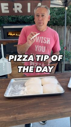 a man standing in front of a pizza pan with doughnuts on it and the words, wish you pizza tip of the day