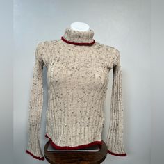 Women's Knitted Sweater Cassone 100% Cotton Mock Neck Cream Color Long Sleeve “Excellent Conditions-Like New-It's Seems Never Was Worn-I Will Say Like New Without Tags” Add A Touch Of Sophistication To Your Style With This Women's Knitted Sweater In Cream Color By Cassone. The Sweater Is Made Of 100% Cotton And Features A Mock Neck And Long Sleeves, Perfect For Cooler Temperatures. The Knit Fabric Type Adds Texture To The Sweater, Giving It A Unique And Stylish Look. This Regular Fit Sweater Is Fitted Soft Knit Cotton Sweater, Winter Cream Fitted Knit Top, Fitted Cream Knit Top For Winter, Fitted Wool Cream Top, Fitted Textured Knit Winter Sweater, Fitted Cream Wool Top, Fitted Knitted Beige Sweater, Fitted Beige Knitted Sweater, Fitted Soft Knit Beige Sweater