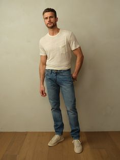 Fit: Mid-rise with a tapered leg. Models are wearing size 31. Fits true to size. Material: 12oz Japanese Denim. 100% BCI Cotton. Eco Brass Buttons. Eco-Wash, using 70% less water. Care: Machine wash cold with like color. Tumble dry low. Do not bleach. Cool ironing. Origin: Made in Los Angeles, CA. Medium Wash Straight Leg Jeans With Welt Pockets, Washed Blue Fitted Tapered Leg Jeans, Dark Wash Jeans With Five Pockets, Straight Leg Jeans With Welt Pockets In Medium Wash, Dark Wash Jeans With Five Pockets For Everyday, Denim Blue Jeans With Five Pockets For Everyday Use, Relaxed Fit Jeans With Recycled Denim, Washed Blue Selvedge Rigid Denim Bottoms, Washed Blue Selvedge Denim Bottoms