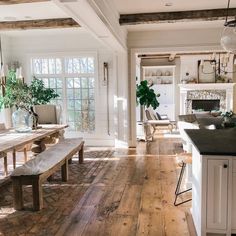 the kitchen is clean and ready to be used as a dining room or breakfast nook