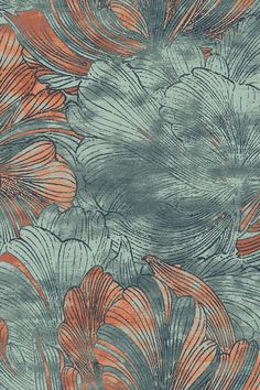 an orange and blue floral pattern on fabric with large flowers in the middle of it