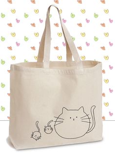 a canvas bag with a drawing of a cat and a mouse on it