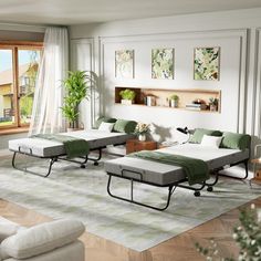 a living room filled with lots of furniture next to a large window and white walls