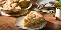 a piece of pie sitting on top of a white plate