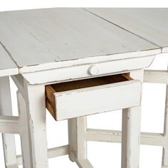 a white wooden table with two drawers