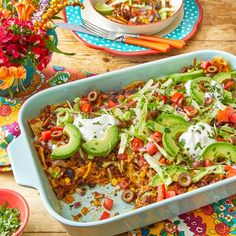 a casserole dish filled with mexican food