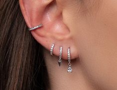 ✨Our Silver Pierced Earring Set is stylish, minimal Style. This Stacking Earring Set is perfect for every day but can also complement a party outfit. This ear stack is a great gift option. Mix and match, you will never get bored of it! :) ✨Product specifications:  * Material: Sterling Silver with Zircon stone.  * Hoops Diameter (inner): 7mm.  * Hoops width: 2mm. ✨✨FREE PERSONALISED GIFT POUCH WITH EVERY ORDER Select a gift pouch colour (lilac or cream - refer to the last photo for guidance) and make it your own by adding up to 10 letters or numbers as a personal touch. I will gladly include a gift message. ✨Care instructions: * Avoid contact with perfumes, lotions, sunscreens etc.  * Cleaning your jewellery: A wipe with a microfiber cloth will remove most dust or dirt. ( Microfiber cloth w Multiple Hoop Earrings Silver, Peircings Women Silver, Three Hoop Ear Piercings, Silver Earrings Set Aesthetic, 3 Ear Piercings In A Row, Earings Aesthetics Silver, Stacked Earrings Silver, Sterling Silver Earring Stack, Jewellery Stacks Silver