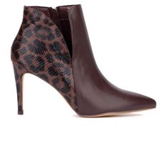 The two-toned Emani booties feature V-shape cutout accents on the sides, stiletto heel, a versatile concept and an easy pull-on style. Faux Leather upper, Slip On entry,3.74\ heel, Pointed toe, Rubber outsole | Women's New York and Company Emani Heeled Booties in Burgundy Size 8.5 Brown Boots Ankle, Boots Chelsea, Shoes Boots Ankle, Closed Toe Shoes, Faux Leather Heels, New York And Company, High Heel Boots Ankle, Boots Ankle, Black Tights