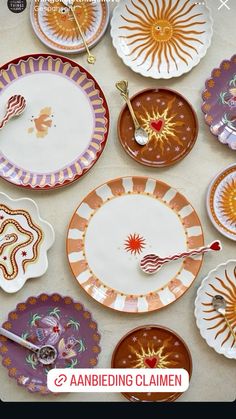 there are many plates on the table together