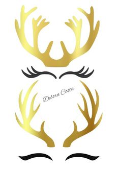 two deer antlers with the words debra costa written in gold and black on them