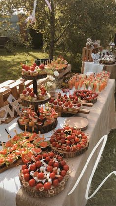 a table with many different types of food on it