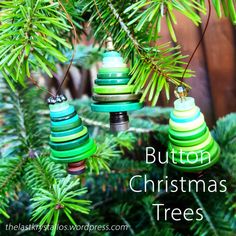 christmas ornaments hanging from a tree with the words button christmas trees