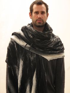 "Mens poncho, Blanket scarf, Huge black scarf, Tribal clothing, Nuno felt scarf, Wool scarf, Gothic scarf, Fur cape, Goth cape, Shaman cape This is a really huge scarf. You can wrap yourself from shoulders to knees or have it around your neck a few times. It is handmade in a nuno felt technique from extra fine merino wool on black cotton gauze. It is very soft, lightweight and warm. I make each scarf myself using only natural materials in my \"Slowlab workshop.\" If you are in a hurry and need y Black Wool Shawl For Winter, Black Wool Winter Shawl, Black Shawl For Winter, Black Winter Shawl Wrap, Black Shawl Wrap For Winter, Black Scarf For Fall, Black Shawl Scarf For Winter, Black One Size Shawl Wrap, Black Winter Scarf Wrap