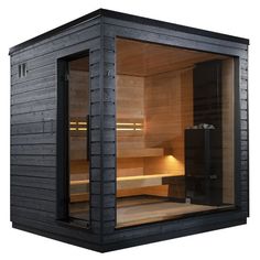 an indoor sauna is shown with the door open to show it's interior