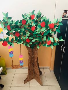 an apple tree made out of construction paper